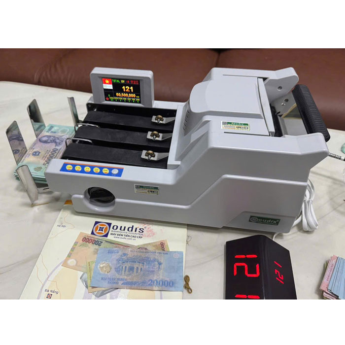 Máy đếm tiền kiểm tra tiền giả Oudis 9899 New